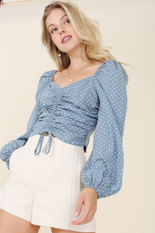 Ruched polka dot crop top with puff sleeves